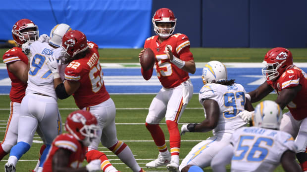 Sep 20, 2020; Inglewood, California, USA; Kansas City Chiefs quarterback Patrick Mahomes (15) drops back to pass against the Los Angeles Chargers during the first quarter at SoFi Stadium. Mandatory Credit: Robert Hanashiro-USA TODAY Sports